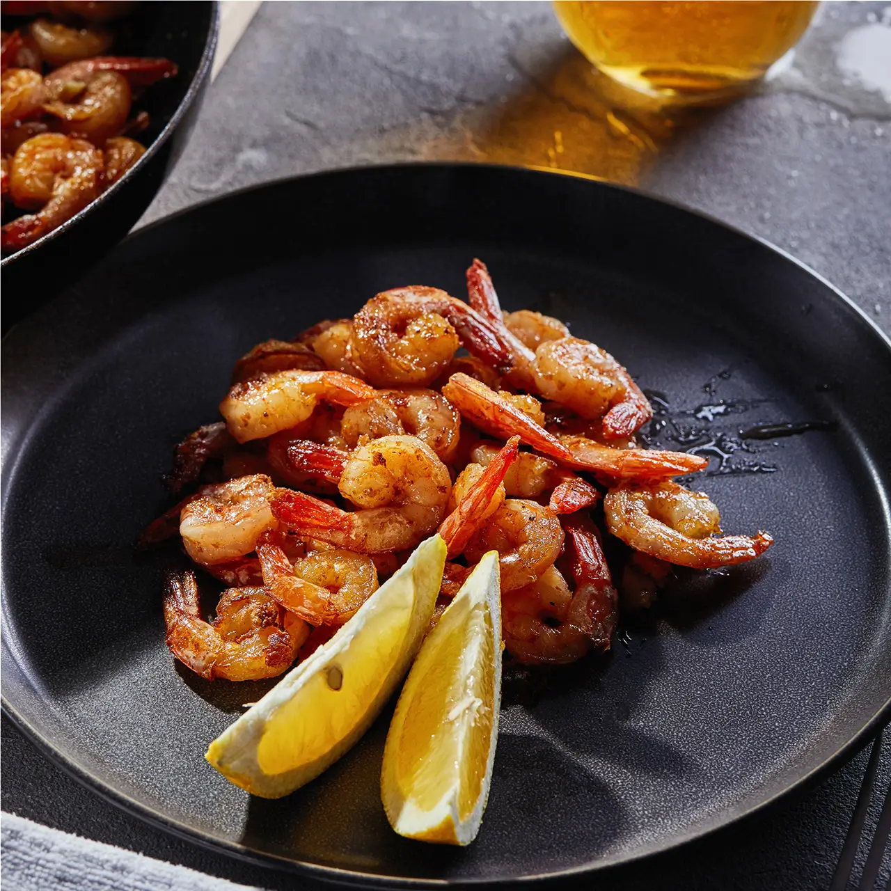 Image of plated shrimp with lemon
